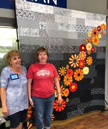 Vicky Skuodas (quiltmaker) and Nancy Anderson (quilt winner)